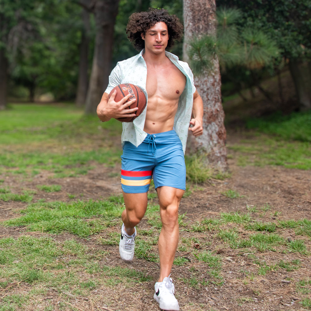 Charlie Santana Wearing Hurley Shirt and Shorts