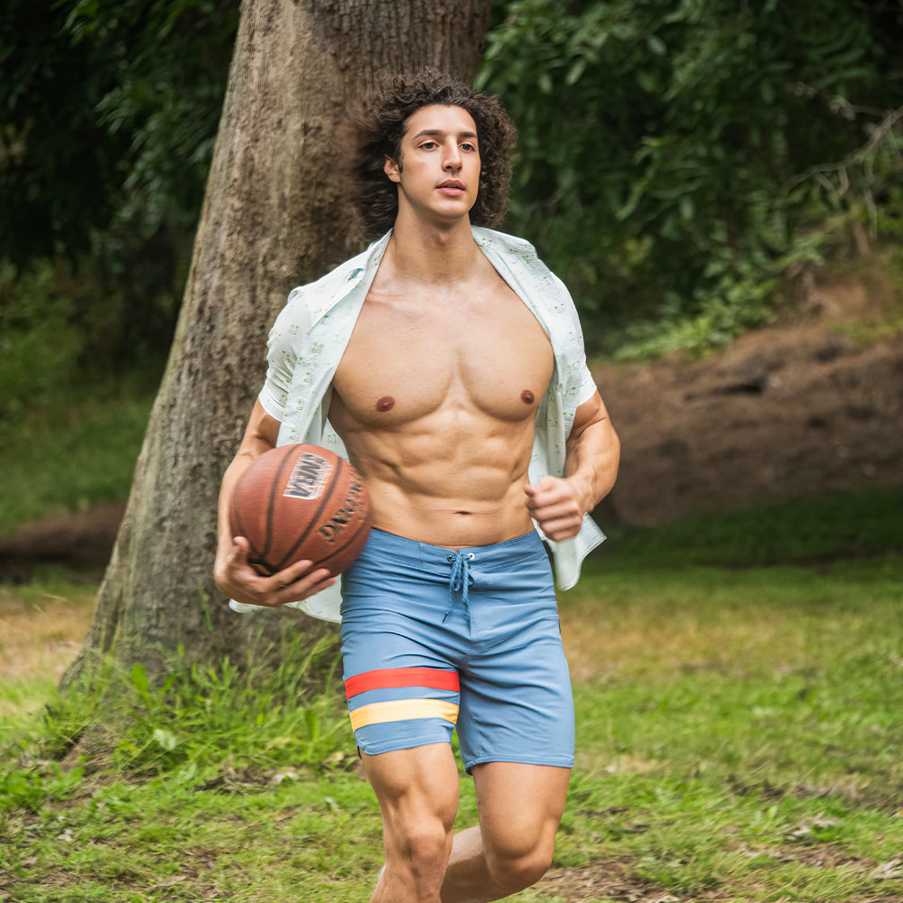 Charlie Santana Wearing Hurley Shirt and Shorts