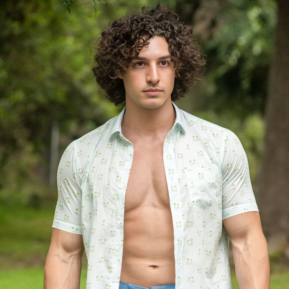 Charlie Santana Wearing Hurley Shirt and Shorts