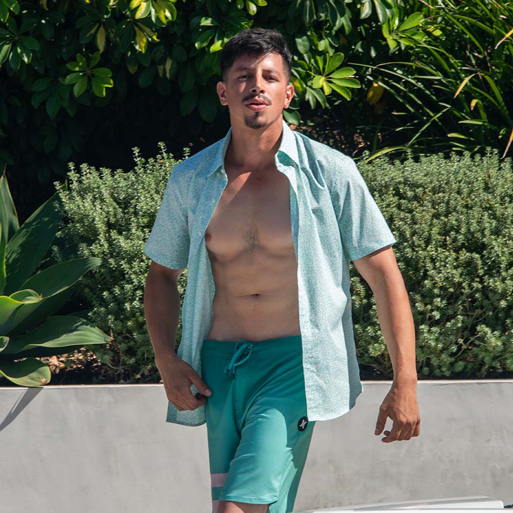 Rich Forbes Wearing a Hurley Shirt and Boardshorts