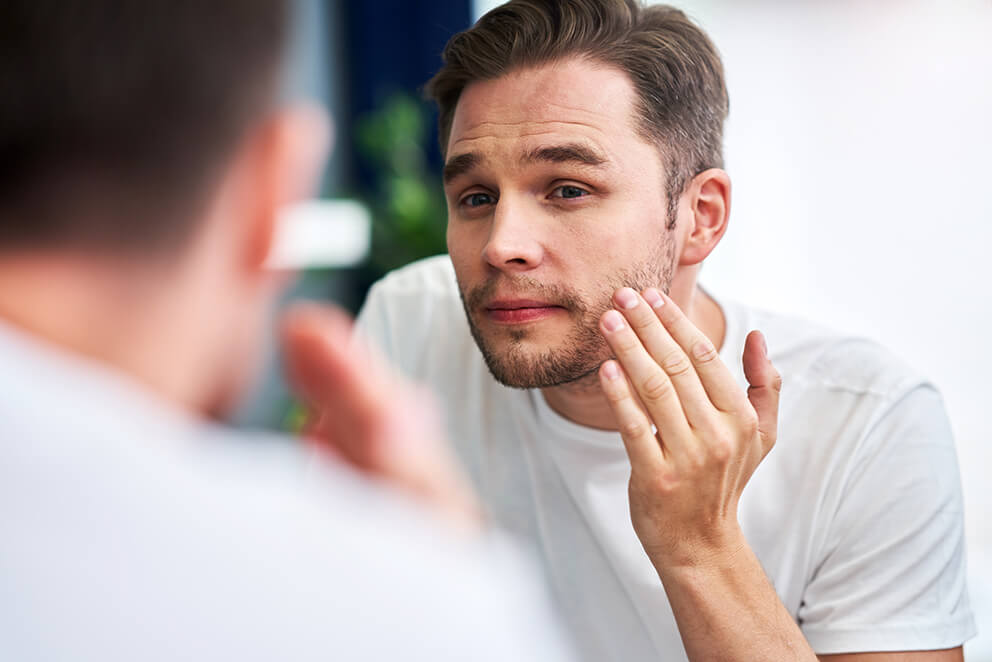 portrait-of-adult-man-shaving-in-the-bathroom-2023-11-27-05-27-49-utc (1)
