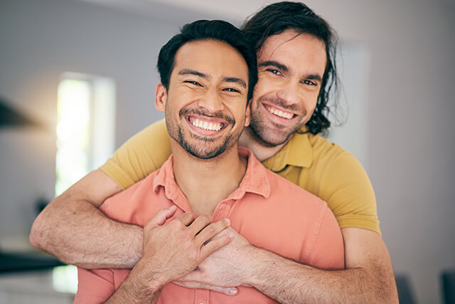 smile-portrait-and-gay-couple-hug-happy-and-swee-2025-04-06-08-09-45-utc (1)